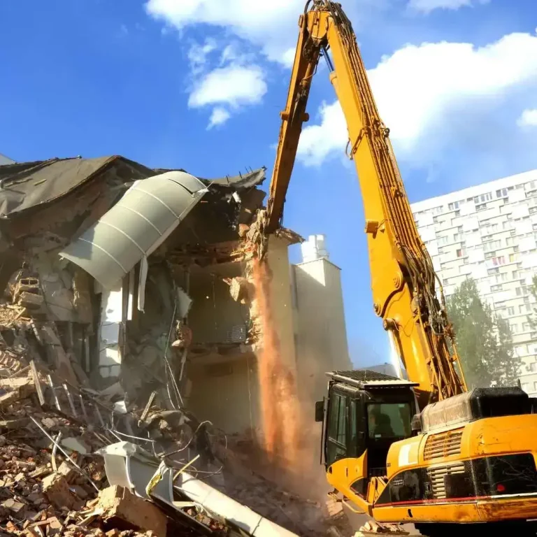 Excavator demolishing a commercial building in Parramatta Sydney