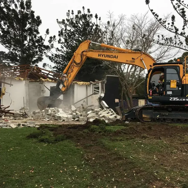 Excavator demolishing a residential in Sydney
